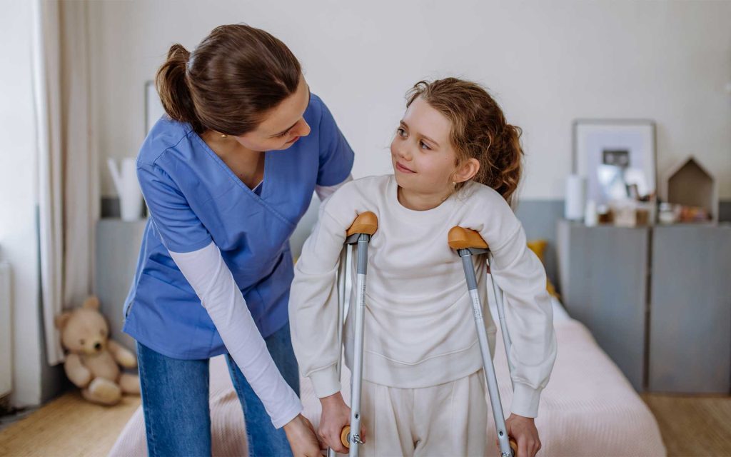 kchh nurse helping girl